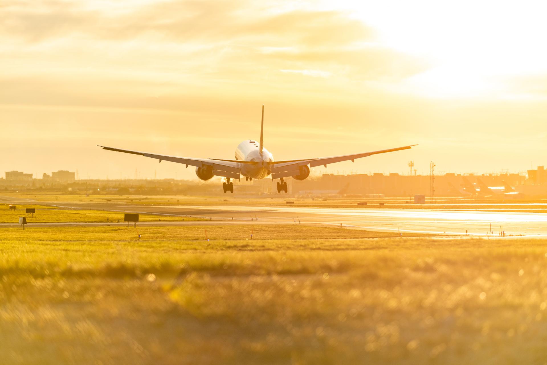 Airplane preparing to take off from the runway in Pearson International airport at dusk, Toronto,Canada